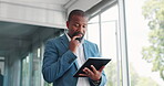 Thinking business black man with tablet for corporate review, strategy and idea for finance, budget and stock market in office building. Focus, data analytics and executive businessman on digital app