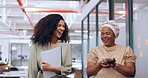 Black women, laughing or walking with business technology, paper or documents in modern office, coworking space or marketing company. Smile, happy or comic creative designers bonding in slow motion