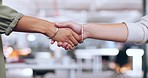 Corporate handshake, closeup and office for woman in agreement, deal or welcome to team in finance startup. Shaking hands, women and thank you for success, contract or partnership for investment goal