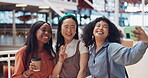 Selfie, friends and social media with woman together posing for a photograph in a mall or shopping center. Phone, social media and smile with a happy female friend group taking a picture for fun