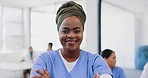 Face, black woman arms crossed and doctor with smile, consultant and in hospital. Leader, African American female and medical professional with happiness, ready for surgery, procedure and healthcare.