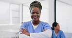 Black woman, healthcare and hospital nurse with arms crossed of medical service, management or surgery. Portrait, smile or happy doctor, surgeon or therapist consulting in clinic, trust or motivation