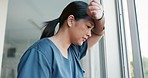 Tired, sad and healthcare professionals with burnout, stress and depression in a hospital. Frustrated, overworked and exhausted medical workers with mental health problems and pain in medicare clinic