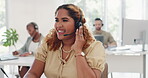 Telemarketing, woman and happy call center consultant talking on call, crm contact us and customer support agent in office. Customer service, employee consulting and smile for help desk conversation