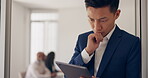 Tablet, research and innovation with a business asian man at work in a boardroom for planning or strategy. Marketing, internet and email with a male corporate employee working in an office