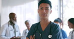 Doctor, asian man and serious face portrait in hospital for mindset motivation, medical health and healthcare vision. Nurse confidence, japanese physician and professional surgeon standing in clinic