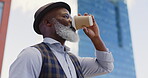 Black senior businessman, coffee and standing city for morning routine, positive mindset vision and remote travel for work. African man, drinking tea and thinking outdoor in New York for traveling