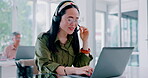 Asian business woman, laptop or call center in coworking office, telemarketing company or b2b sales startup. Smile, happy or talking receptionist on technology headset in customer support help or crm