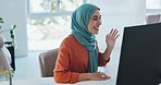 Corporate muslim woman, wave and video call with computer, smile and online communication in office. Islamic crm expert, pc and waves with happiness for meeting on app, internet and focus in Beirut