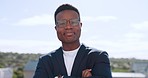 Face, black man and arms crossed with smile, leader and confidence for startup company. Nigerian male, ceo and entrepreneur for business, corporate goal and manager with career success and outdoor.