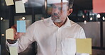 CEO, sticky note or senior manager writing a marketing strategy or brainstorming ideas for business growth. Businessman, boss or Indian entrepreneur with mission, goals or vision planning a project