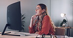 Business woman, thinking and focus with computer and working, reading and research for company proposal, typing and writing report. Corporate employee, keyboard and computer screen in office.