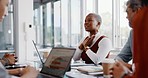 Meeting, discussion and professional black woman talking to her colleagues in the office conference room. Teamwork, presentation and African female employee in conversation with her team for project.