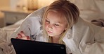 Bed, games and girl child with tablet for evening leisure entertainment online with cozy duvet. Night, relax and young kid enjoying app gaming with cyber security tech in a comfortable bedroom.