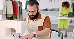 Sewing fabric, male designer and textile sewer working of a man and tailor machine in a studio. Fashion manufacturing, fabric work and clothes business with creative retail store worker in a workshop