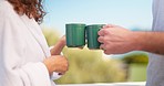 Couple, hands and people cheers coffee in the morning on vacation or holiday at a hotel or on the balcony. Lovers, man and woman holding hot beverage in a cup and celebrating enjoying quality time