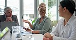 Discussion, advice and business people in a meeting for planning, collaboration and team strategy. Communication, teamwork and black woman speaking about a plan, information and ideas for an agency