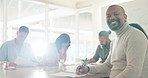 Business, leadership and black man with smile at meeting or workshop for strategy, planning and performance report. Teamwork, collaboration and happy businessman ceo at table at advertising agency.