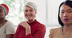 Business people, portrait and mature woman in audience for training, smile and happy workshop. Face, business meeting and senior lady sitting in group with diversity, vision and conference in office