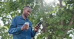 Phone, outdoor and black man with job opportunity, career news and online networking ideas, vision and goals. Happy business person, coffee break and smartphone for news, feedback or mobile chat app