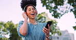 Music, phone and headphones, woman in park happy and excited while dancing in garden trees. Technology, smartphone and dance, happy woman enjoying streaming service or free internet radio station.