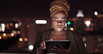 Tablet, night and balcony with a business black woman doing research while working outdoor at her office. Finance, accounting and data with a female employee using an online search app outside