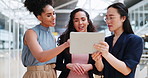 Tablet, collaboration and business women with teamwork marketing strategy and website planning. Digital technology, diversity and creative employees review new design, feedback or ideas communication