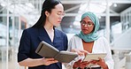 Notebook, tablet or communication of team walking, talk and planning agenda schedule. Women collaboration teamwork, retail shopping mall or diversity partnership of Asian assistant and Islamic Muslim