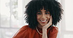 Face, vision and mindset with a business black woman sitting at a desk with her hand on her chin. Portrait, happy and smile with a female employee thinking about future growth or company development