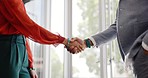 Closeup, handshake and businessman with woman, welcome or respect at meeting, workplace or interview. Business people, greeting and shaking hands in agreement, contract or thank you at finance agency