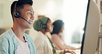 Call center, asian man and communication on computer for business advisory, telemarketing and crm. Salesman, consultant and online technology in telecom office for client support, web help and advice