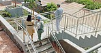 Top view, business people or walking on stairs outdoor, conversation or planning with sunshine. Team, man or women on steps together, walk towards office or talking outside, chatting or communication