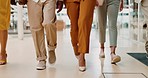 Office, shoes and group of business people walking together to a corporate work meeting. Professional, walk and feet of employees with fancy, luxury and stylish footwear in the modern workplace. 