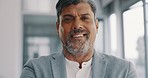 CEO, face or senior businessman with leadership, success mindset or corporate experience in office building. Mentor, portrait or happy Indian manager director with career goals, vision or motivation