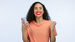 Winner, phone and black woman isolated on a white background for winning, bonus or competition online. Wow, surprise and success person on smartphone fist hands, yes and sale or opportunity in studio