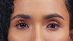 Eyes, face and vision of woman with focus, awareness and cosmetics, contact lenses and wellness. Closeup, zoom and portrait of person with brown eyes, eyelashes and healthy optical sight for beauty 