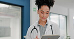 Black woman, walking or doctor on hospital tablet for surgery research, life insurance app or medical planning. Smile, happy or healthcare worker on technology test results or reading medicine choice