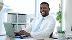 Smile, laptop and face of black man in office for connection, email and online proposal. Technology, search and professional with corporate employee typing at desk for expert, digital and browsing