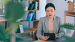 Asian, tablet and business woman typing in office, social media or internet browsing. Technology, email and female entrepreneur with touchscreen for web scrolling, networking or research in workplace