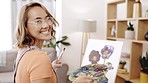 Asian, woman painter and home with face, smile and canvas for art, happiness or creative flowers in living room. Artist, gen z girl and happy for creativity in studio, lounge or apartment in portrait