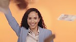 Money rain, black woman and face of business employee with cash and bank investment with a smile. Isolated, orange background and studio with a financial accountant success with lotto notes and win