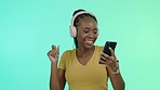 Headphones, music and black woman dancing with phone, smile and studio color lights in background. Happiness, streaming service and dance, African dj on fun online radio station or party celebration