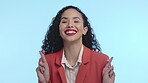 Luck, hope and wish with a black woman in studio, fingers crossed on a blue background for superstition. Portrait, hopeful and hand gesture with an attractive young female waiting in anticipation