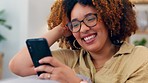 Laugh, phone and black woman on a sofa for social media, texting or funny meme in her home. Online, comic and girl relax with smartphone on couch, chatting and reading post or update in living room