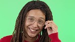 Happy, face and man with glasses in studio with a positive, optimistic and good mindset. Happiness, smile and portrait of hipster male model with dreadlocks and spectacles posing by green background