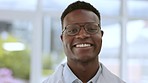 Doctor face, black man smile and proud in a medical, healthcare and wellness hospital. Portrait, happiness and medicare of a health worker employee from Nigeria ready for clinic development and help