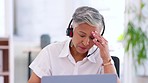 Business woman, laptop and call center headache in CRM mistake, customer support crisis or sales telemarketing. Stress, anxiety and burnout for mature worker, receptionist or consultant on technology