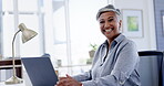 Laptop, happy and management with a business woman at work on a review, proposal or report in her office. Computer, smile and research with a senior female manager working on an agenda or schedule