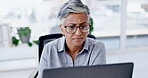 Business woman or boss on laptop with reading glasses for email, software management or data analysis in office. Thinking, serious or planning senior manager or female on computer for online research