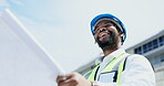 Black man, architect and blueprint in city for planning, construction or building with safety helmet at site. Happy African male contractor with floor plan and hard hat smiling for industrial work